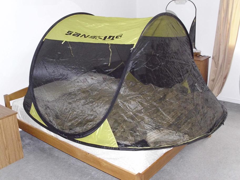 3 person screen tent on a queen bed
